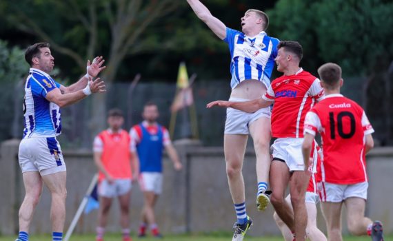 Boden's Michael Darragh MacAuley and Michael McDonald challenge for a ball during Saturday's game against Cuala. Credit: John Kirwan